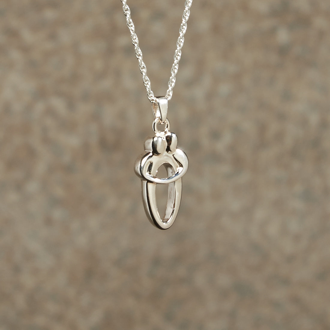 Loving Couple Cremation Pendant; Sterling Silver